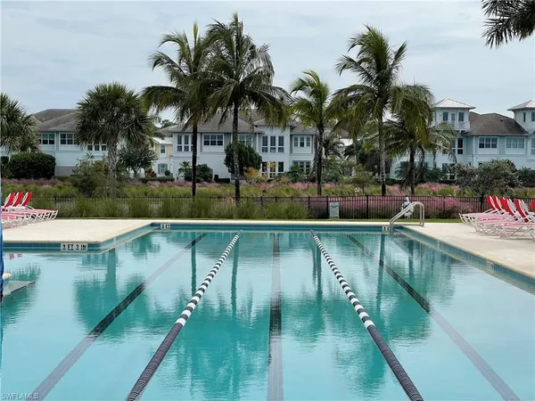 a view of swimming pool with a patio