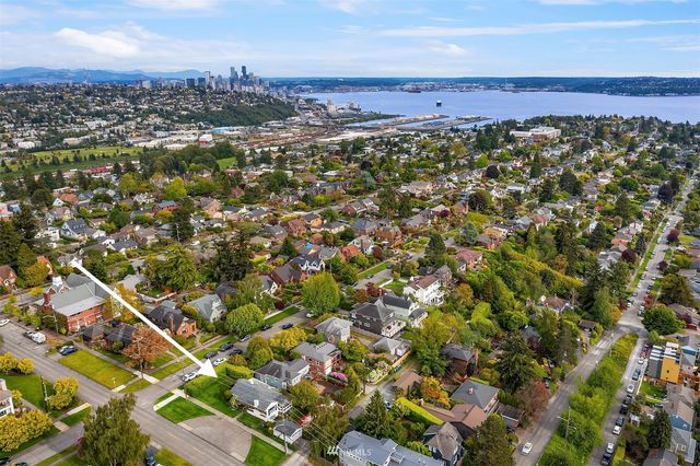 an aerial view of a house with a garden