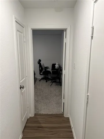 a bathroom with a sink a toilet a shower curtain and a bath tub