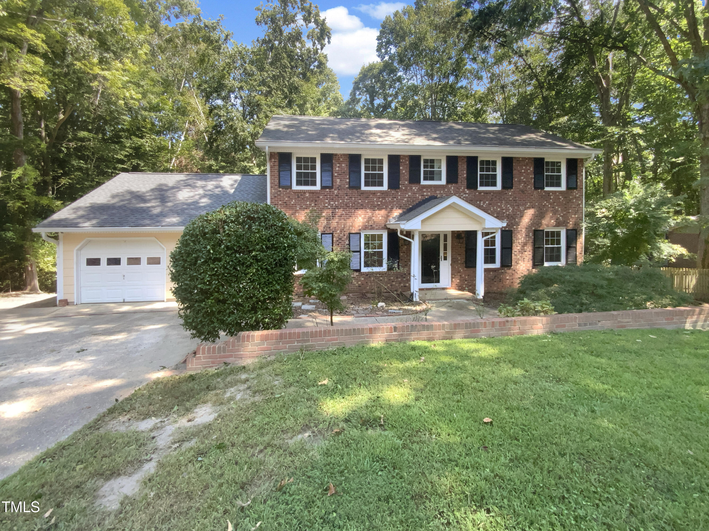 4808 Connell Drive Raleigh, NC 27612 - Photo 1 of 20 front view of a house with a yard