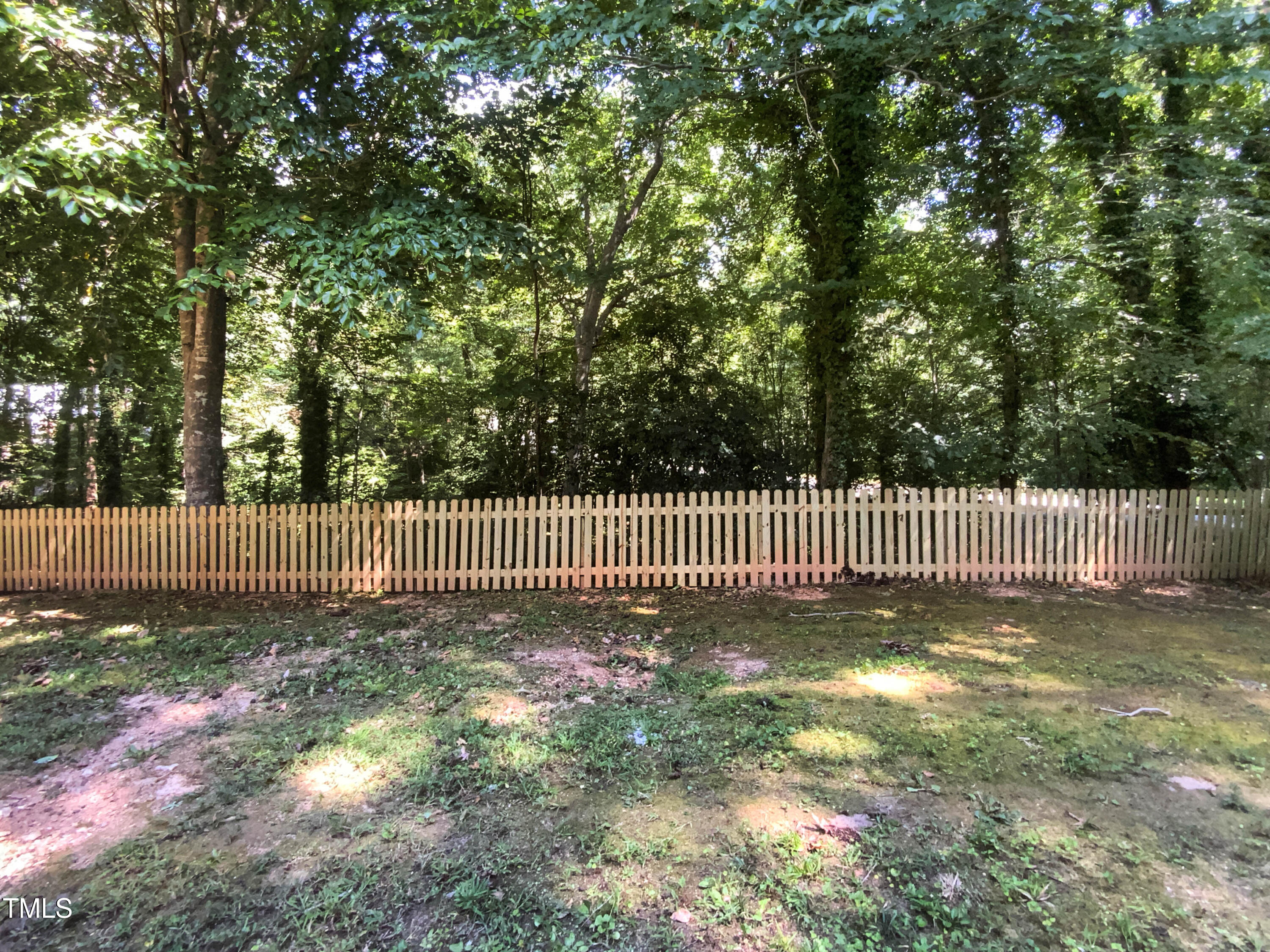 4808 Connell Drive Raleigh, NC 27612 - Photo 19 of 20 a side view of a garden