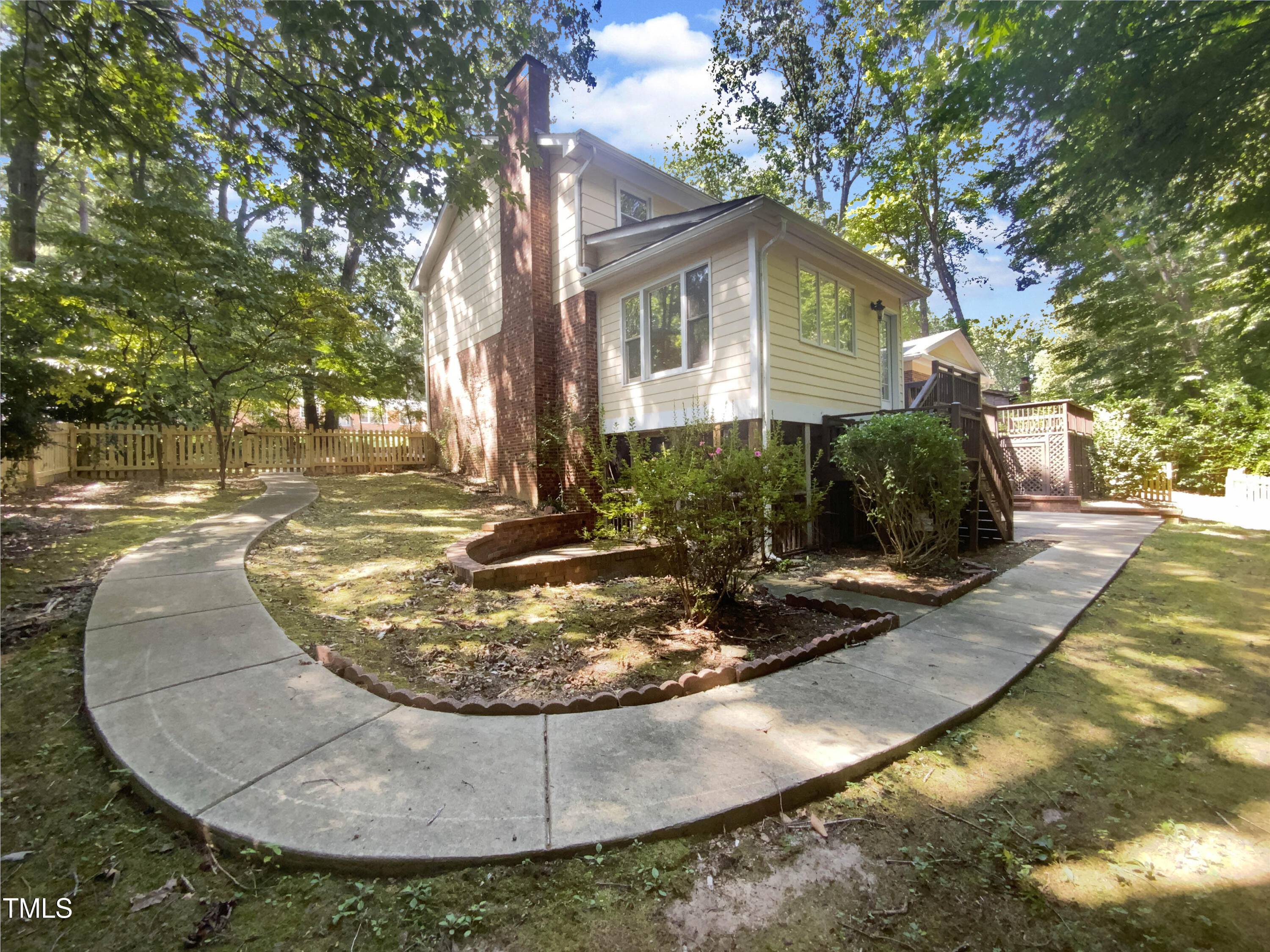 4808 Connell Drive Raleigh, NC 27612 - Photo 20 of 20 a view of a house with yard
