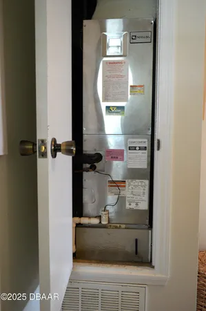 a view of a house with pool and a yard