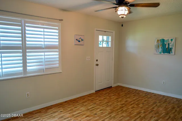 a view of a livingroom with a window