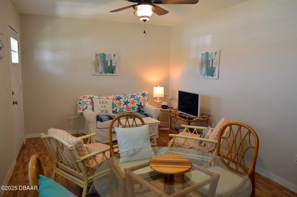 a view of a dining room with furniture