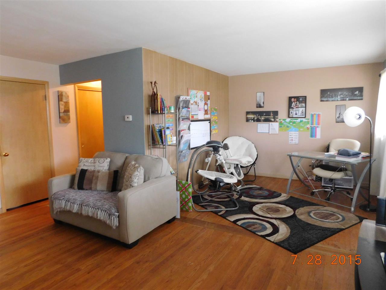1807 South Alpine Road Rockford, IL 61108 - Photo 3 of 9 a living room with furniture and a wooden floor