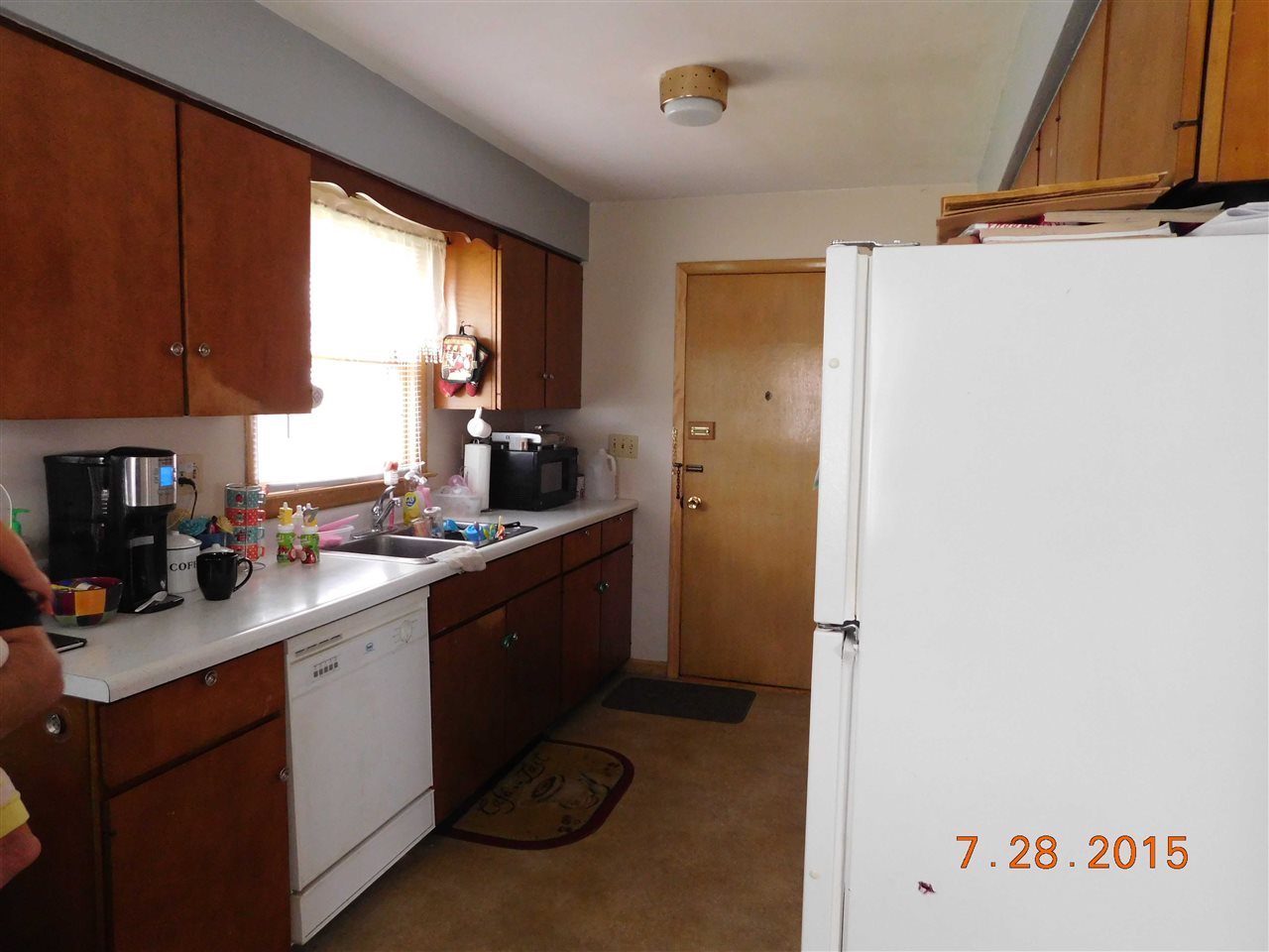 1807 South Alpine Road Rockford, IL 61108 - Photo 5 of 9 a kitchen with a sink cabinets and a window