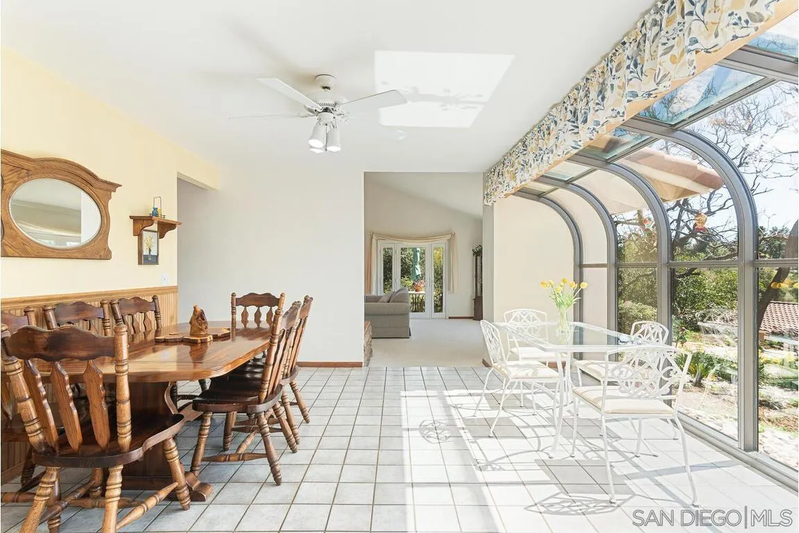 2877 Polk Road Alpine, CA 91901 - Photo 15 of 40 a view of a dining room with furniture and wooden floor