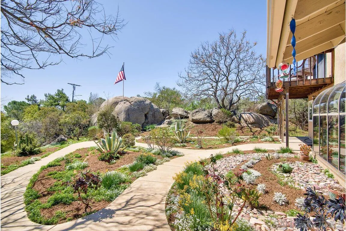 2877 Polk Road Alpine, CA 91901 - Photo 26 of 40 a view of a yard with plants and trees