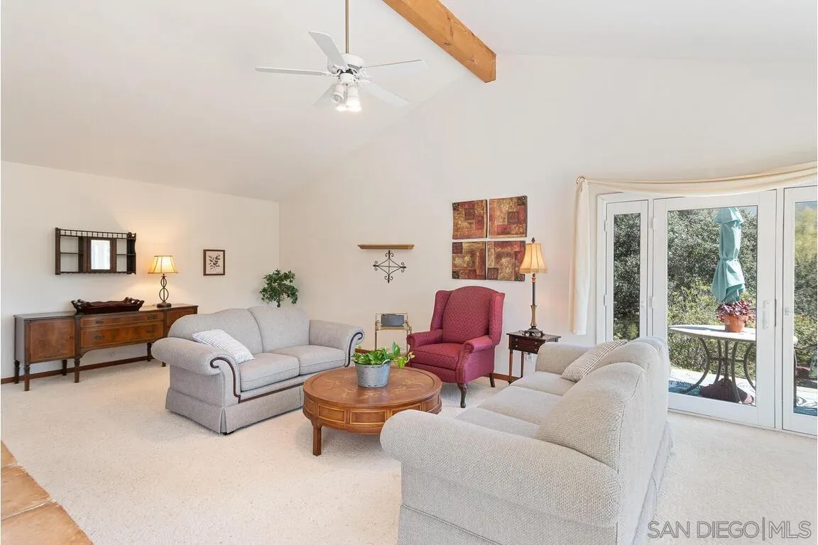 2877 Polk Road Alpine, CA 91901 - Photo 7 of 40 a living room with furniture and a large window