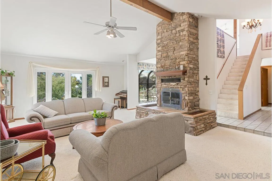 2877 Polk Road Alpine, CA 91901 - Photo 9 of 40 a living room with furniture and a large window
