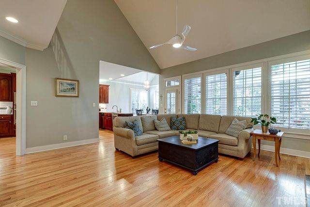 a large kitchen with lots of counter space sink and a dishwasher