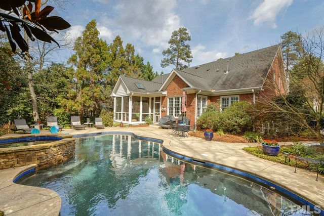 a front view of a house with swimming pool