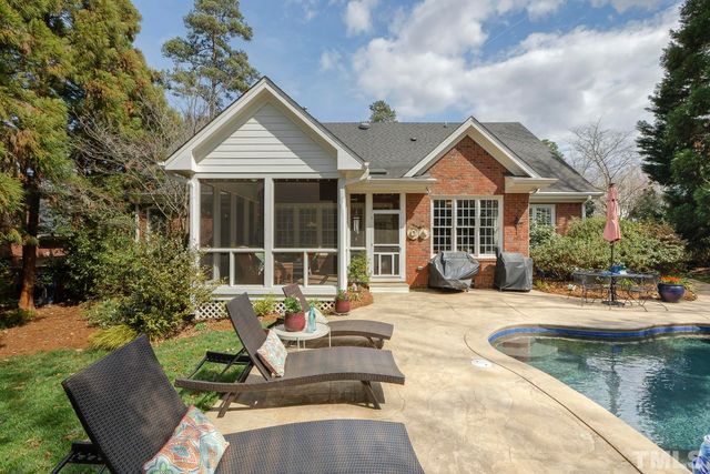 a house view with a sitting space and garden space