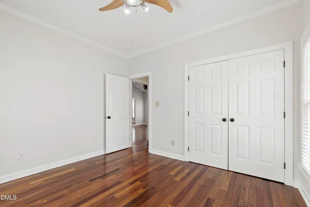 a view of room with hardwood floor