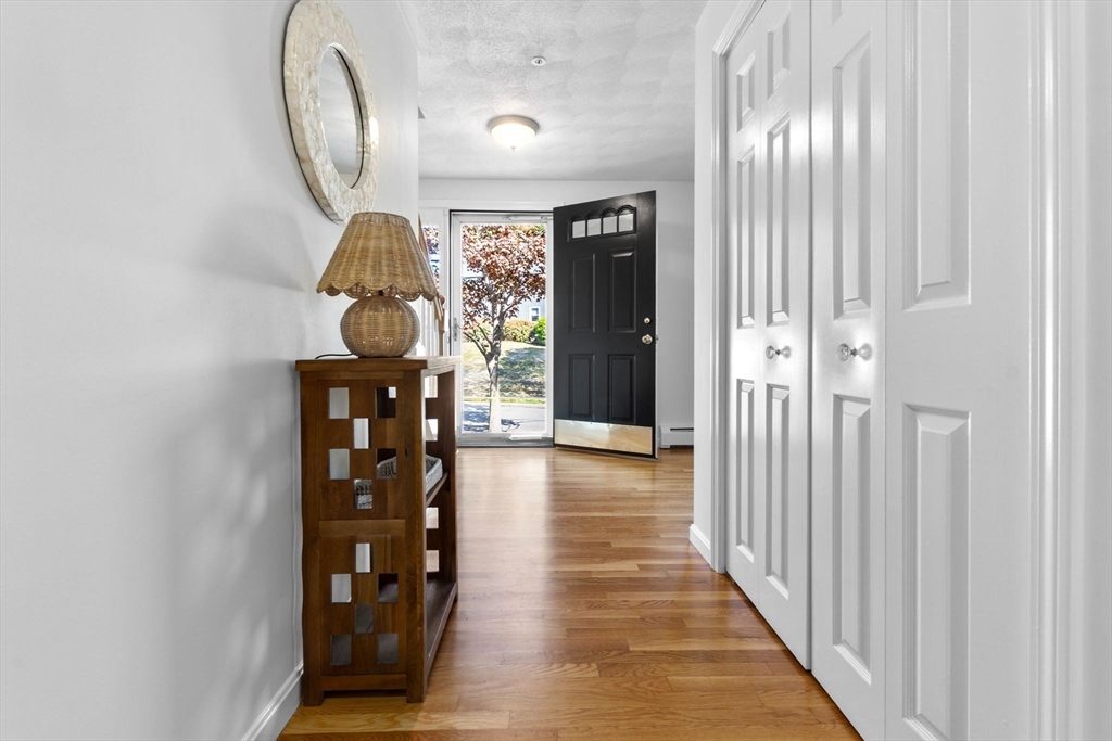40 Cornell Road Beverly, MA 01915 - Photo 15 of 31 a view of a hallway with wooden floor and entryway