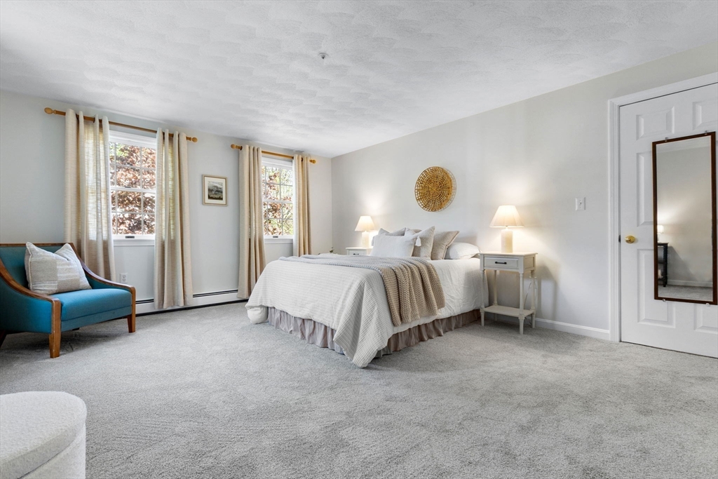 40 Cornell Road Beverly, MA 01915 - Photo 19 of 31 a bedroom with a bed and a couch