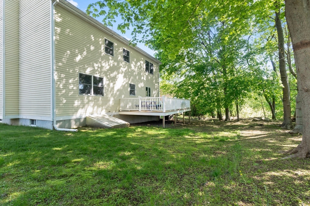 40 Cornell Road Beverly, MA 01915 - Photo 2 of 31 a view of a house with backyard and sitting area