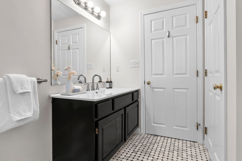 40 Cornell Road Beverly, MA 01915 - Photo 26 of 31 a bathroom with a sink and a mirror