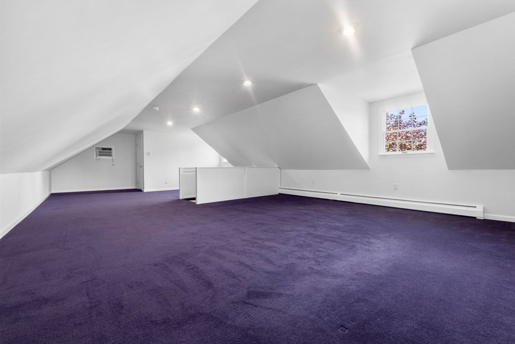 40 Cornell Road Beverly, MA 01915 - Photo 28 of 31 an empty room with a projector and white walls