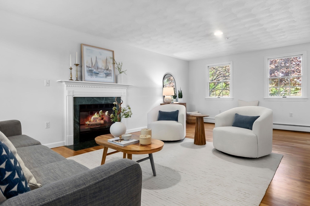40 Cornell Road Beverly, MA 01915 - Photo 3 of 31 a living room with furniture and a fireplace