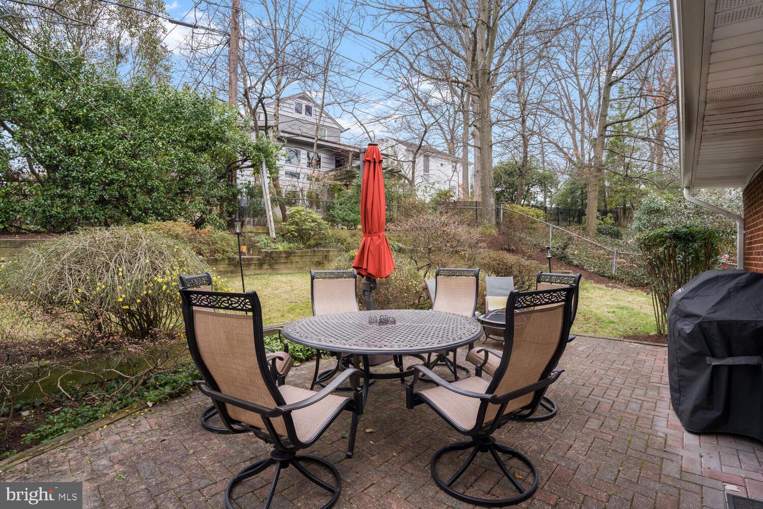412 Underhill Place Alexandria, VA 22305 - Photo 31 of 45 a view of a backyard with furniture and a grill