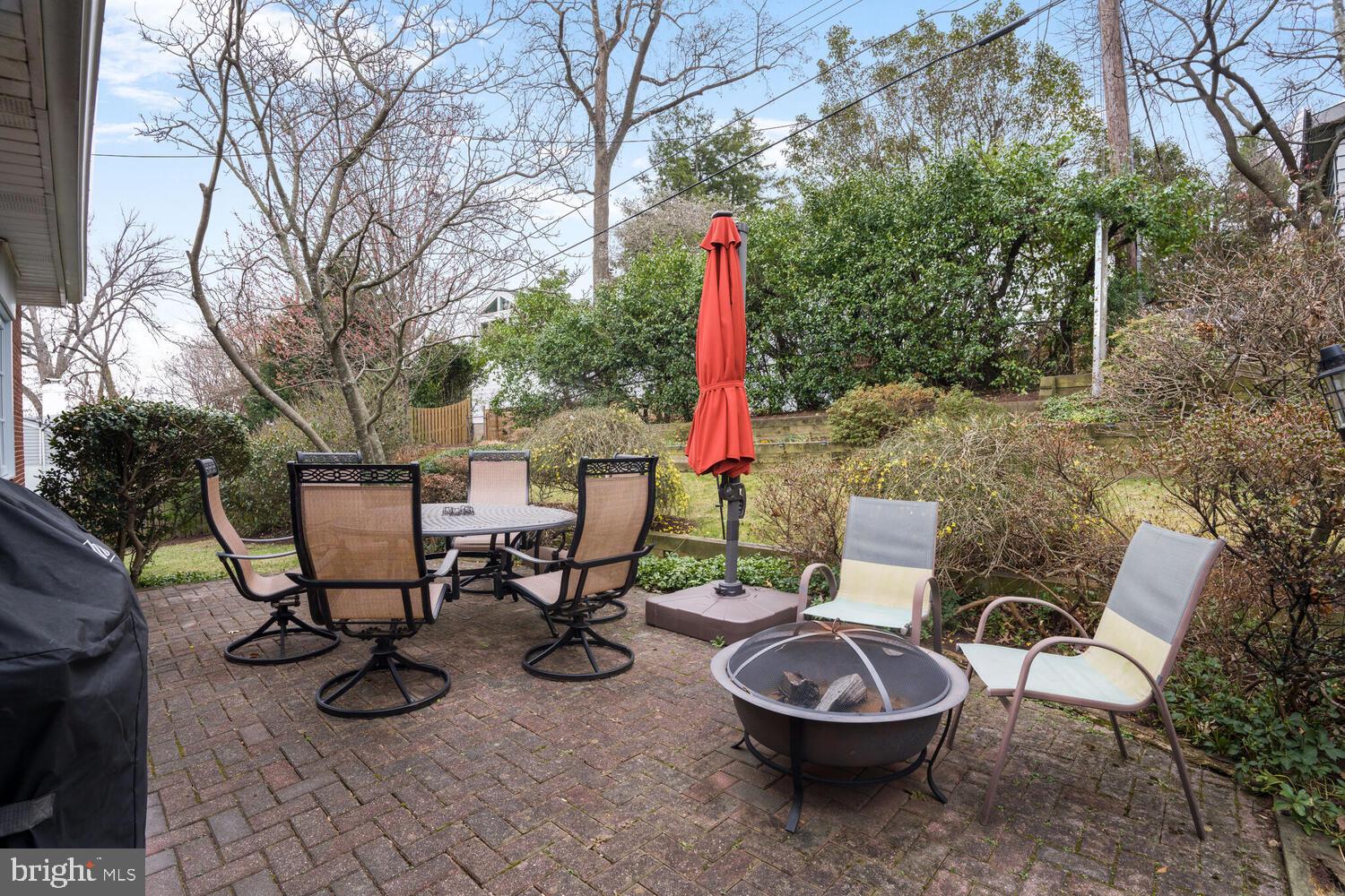 412 Underhill Place Alexandria, VA 22305 - Photo 32 of 45 a view of a backyard with furniture and a grill