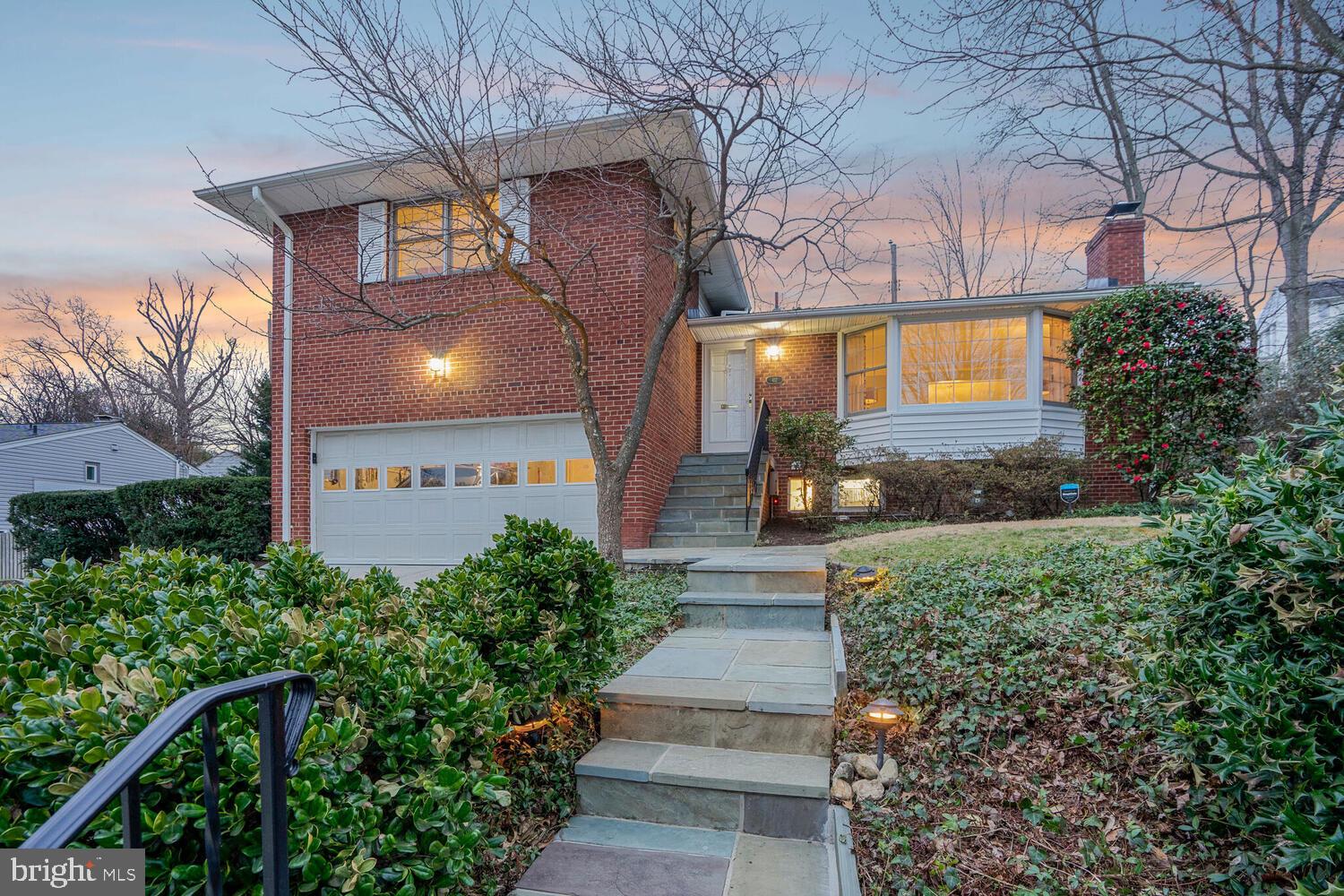 412 Underhill Place Alexandria, VA 22305 - Photo 34 of 45 a view of a pathway of a house with a yard and large trees