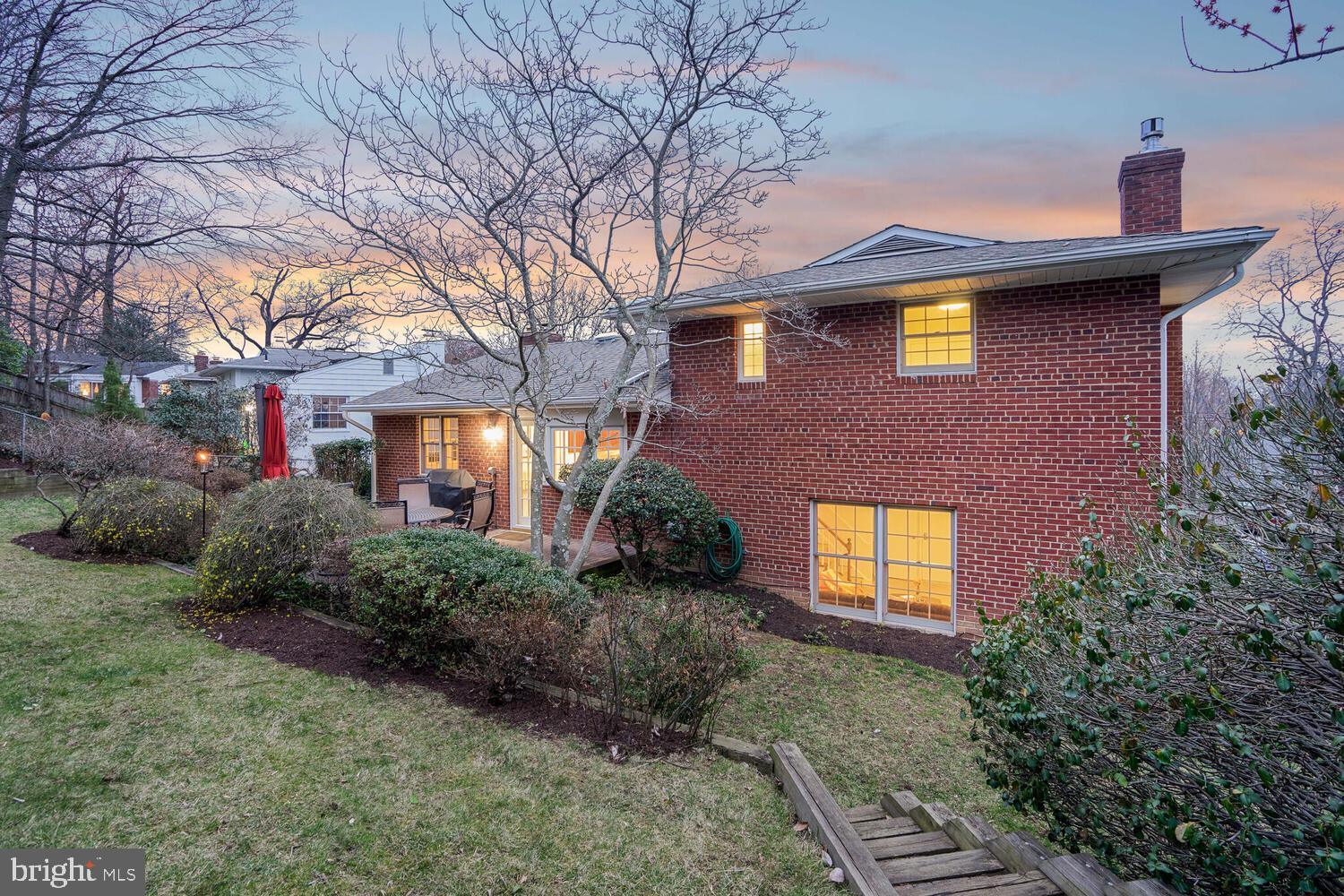 412 Underhill Place Alexandria, VA 22305 - Photo 35 of 45 a front view of a house with a yard