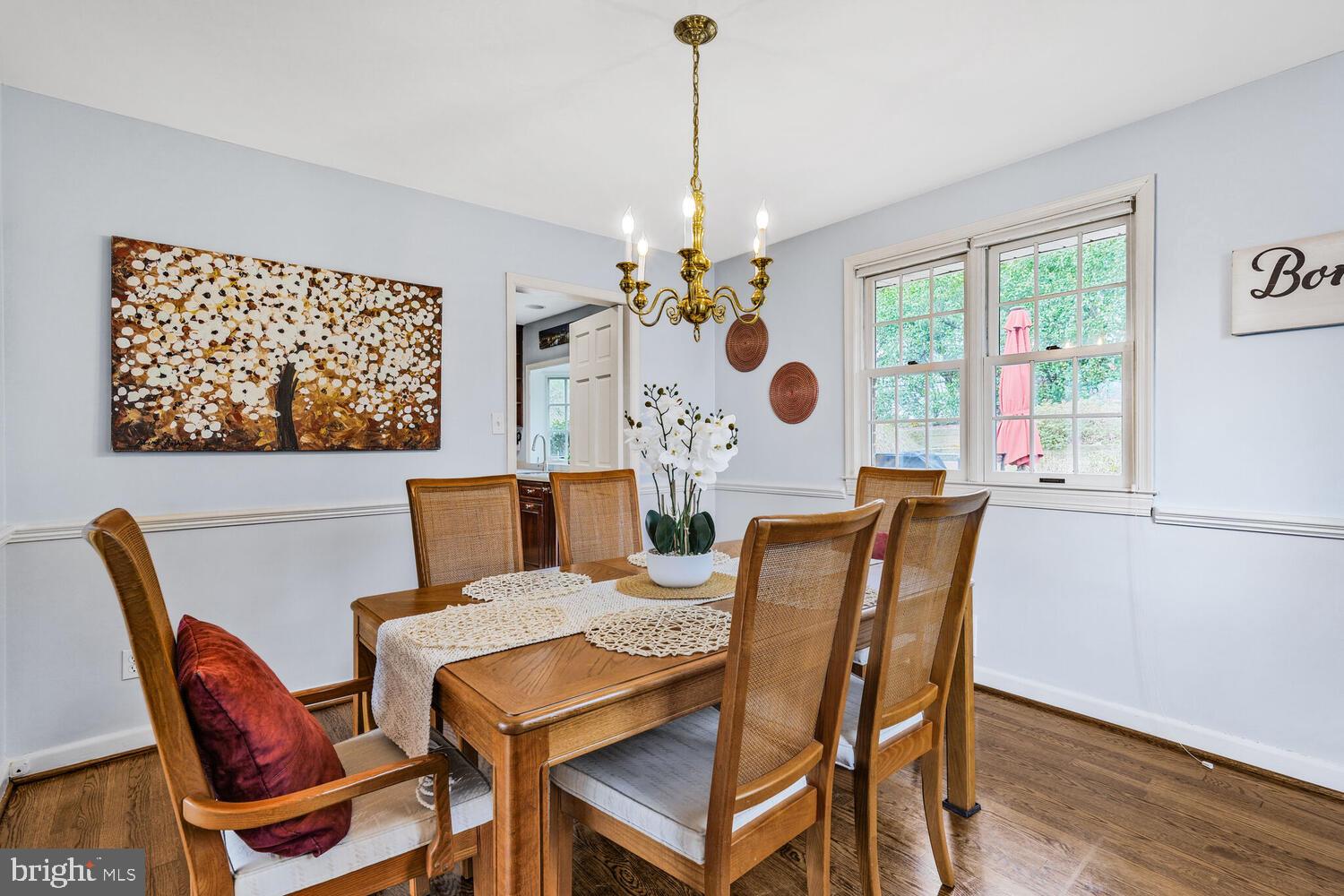 412 Underhill Place Alexandria, VA 22305 - Photo 7 of 45 a view of a dining room with furniture window and wooden floor