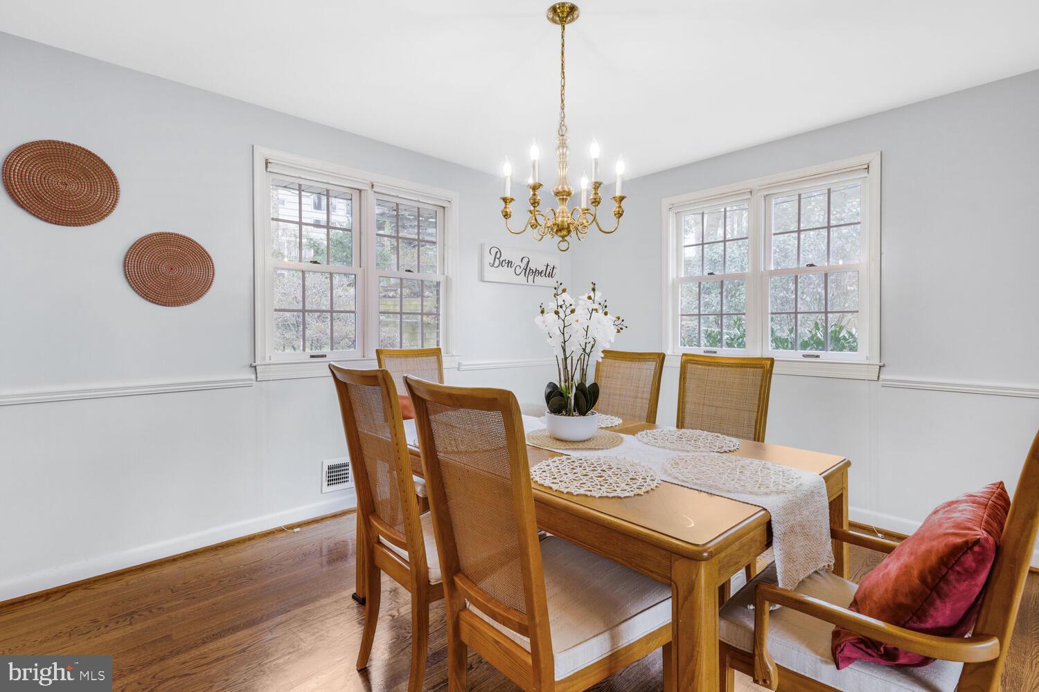 412 Underhill Place Alexandria, VA 22305 - Photo 8 of 45 a view of a dining room with furniture wooden floor and chandelier
