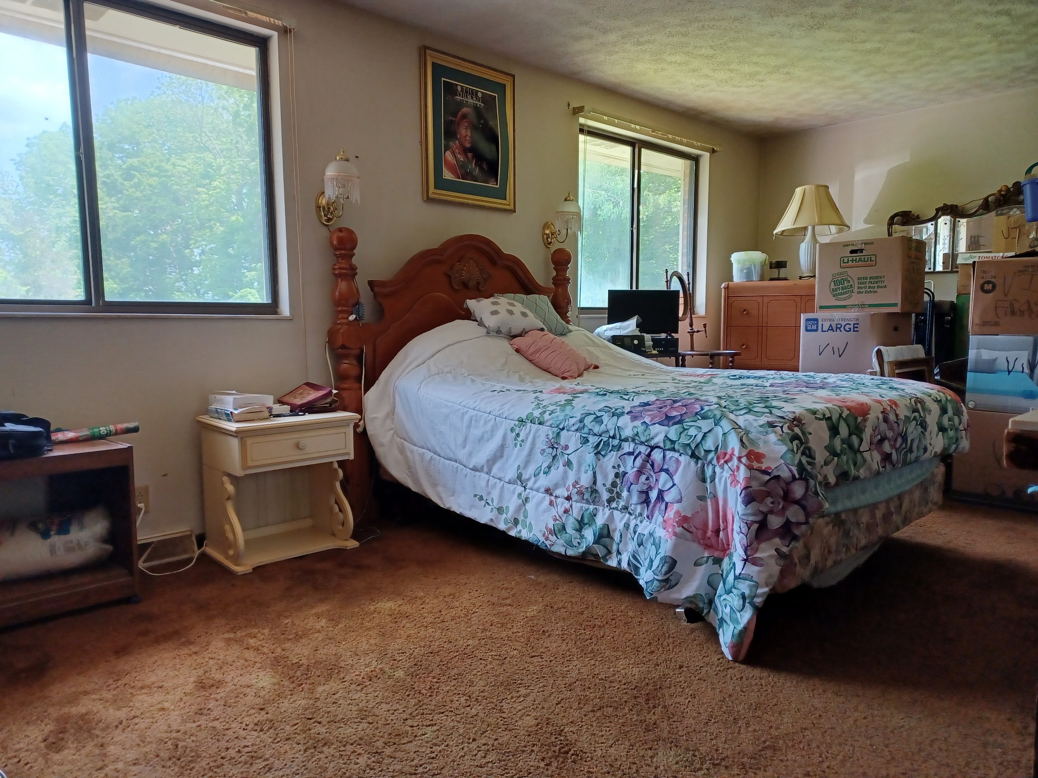 2150 Hogan Road Burns, TN 37029 - Photo 29 of 58 a bedroom with a bed and a dresser next to a window