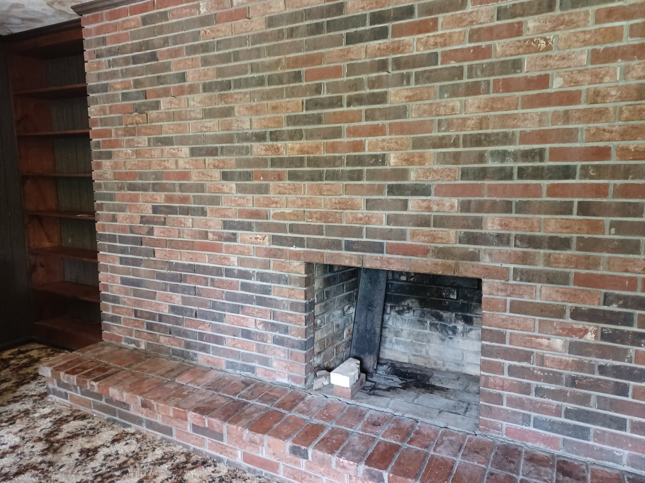 2150 Hogan Road Burns, TN 37029 - Photo 31 of 58 a bathroom with a brick wall and a sink
