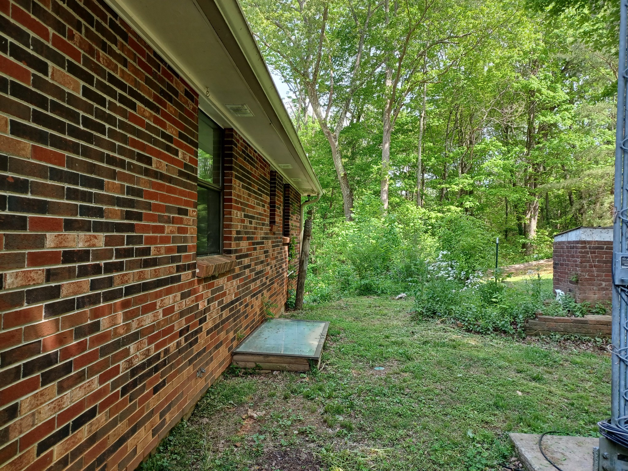 2150 Hogan Road Burns, TN 37029 - Photo 10 of 58 a view of a backyard with of the house