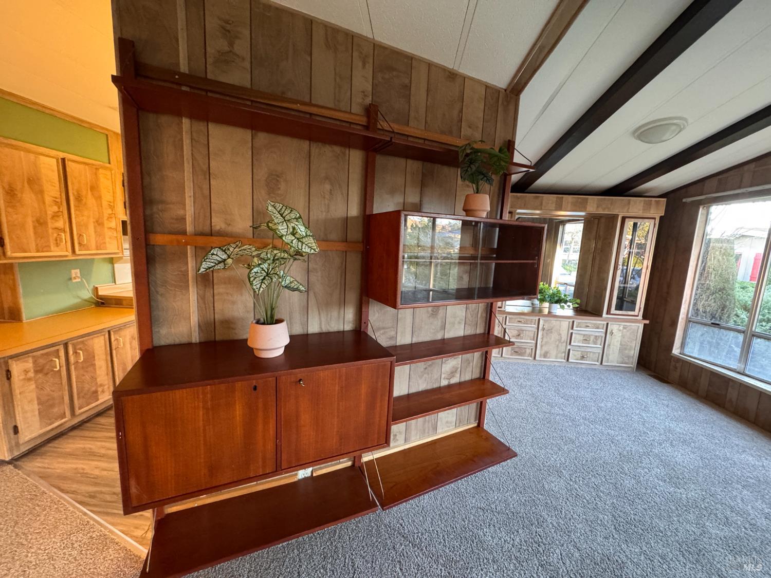 137 Bluestone Court Santa Rosa, CA 95409 - Photo 4 of 35 Living room, kitchen divider with built in shelves to show off your collectibles
