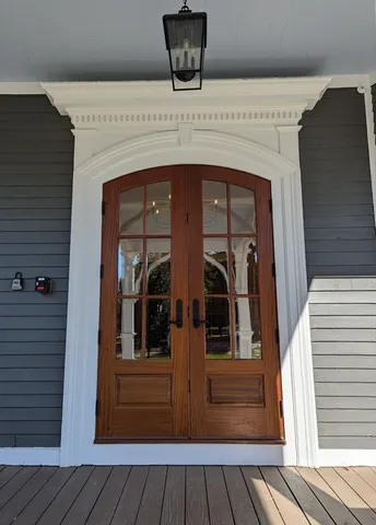 a view of front door and bedroom