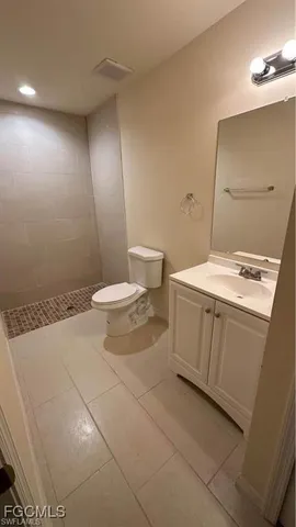 a view of backyard of a house