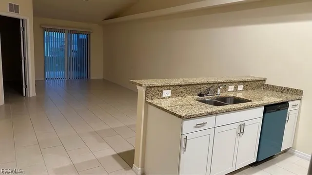 a utility room with washer and dryer