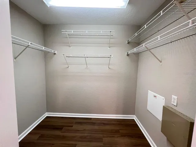 a bathroom with a double vanity sink and mirror