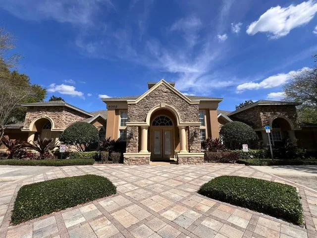 a lobby with furniture and window