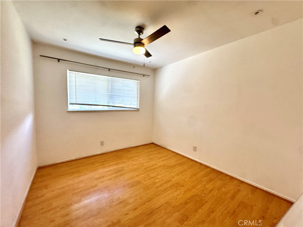 2065 Morley Street Simi Valley, CA 93065 - Photo 8 of 13 a view of empty room with wooden floor