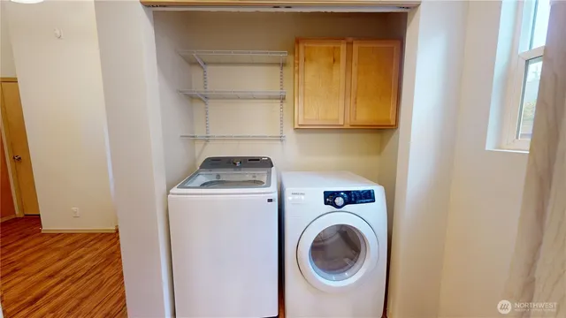 a room with a sink and a mirror