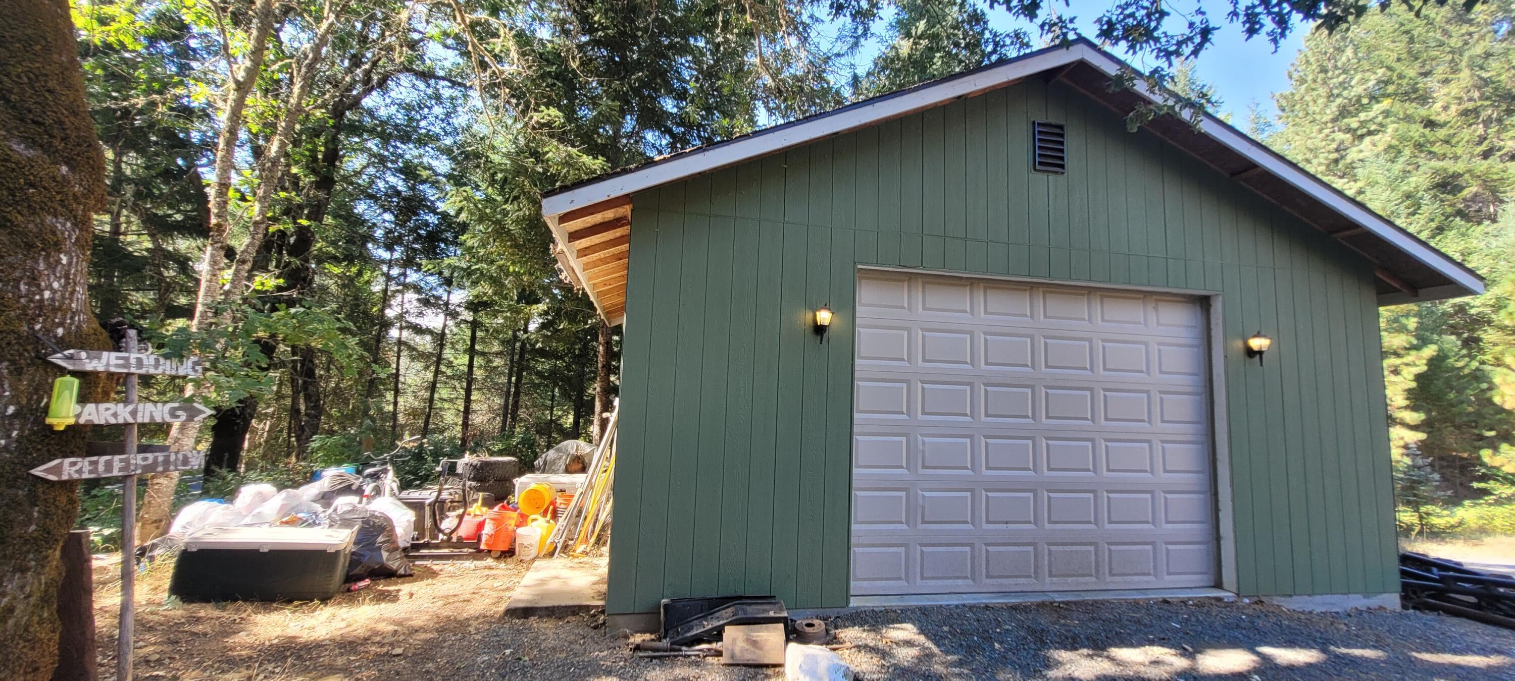 744 Crooks Creek Road Selma, OR 97538 - Photo 17 of 18 Separate shop with pull down stairs for storage and work shop area.