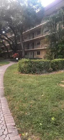 a view of building with yard