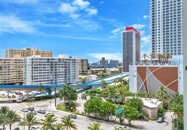 a view of a city with tall buildings