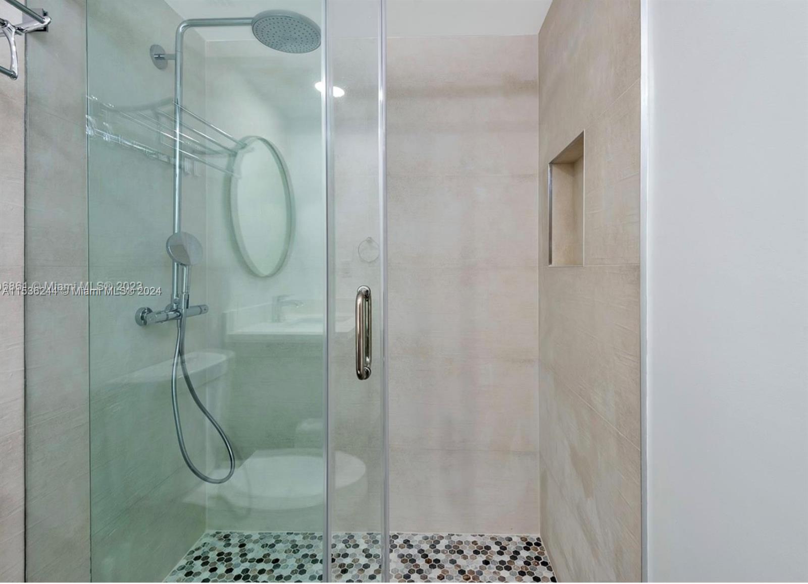 4001 South Ocean Drive, Unit 9F Hollywood, FL 33019 - Photo 24 of 25 a bathroom with a shower