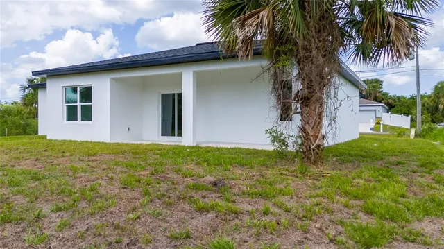 a house with a tree in front of it