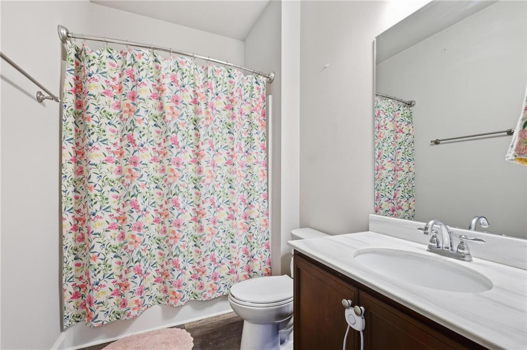 47 Violet Lane Dallas, GA 30132 - Photo 20 of 27 a bathroom with a sink toilet and shower