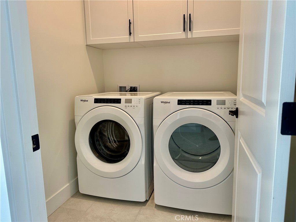 189 Cessna Court San Luis Obispo, CA 93401 - Photo 10 of 13 a utility room with dryer and washer