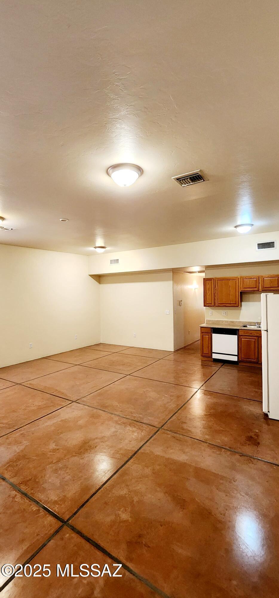 533 West San Xavier Road Tucson, AZ 85713 - Photo 13 of 21 a view of a room with wooden floor